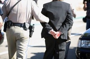 Man-in-Cuffs-with-cop