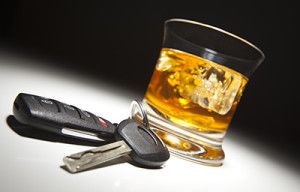 Alcoholic Drink and Car Keys Under Spot Light | Felony DUI Law Goes Into Effect in Colorado