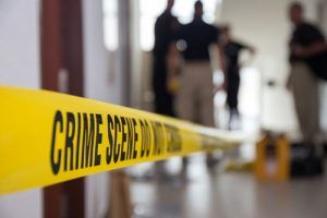 crime-scene-tape-in-building-with-blurred-forensic-team-background Colorado Search and Seizure Laws
