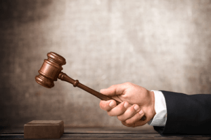 Judge banging a gavel | Boulder Municipal Code Title V Chapter 1