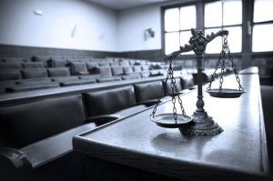 scales-of-justice-on-desk-in-courtroom | probation in colorado