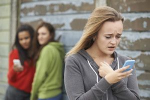 Teenage Girl Being Bullied By Text Message | Cyberbullying in Colorado is Now a Misdemeanor